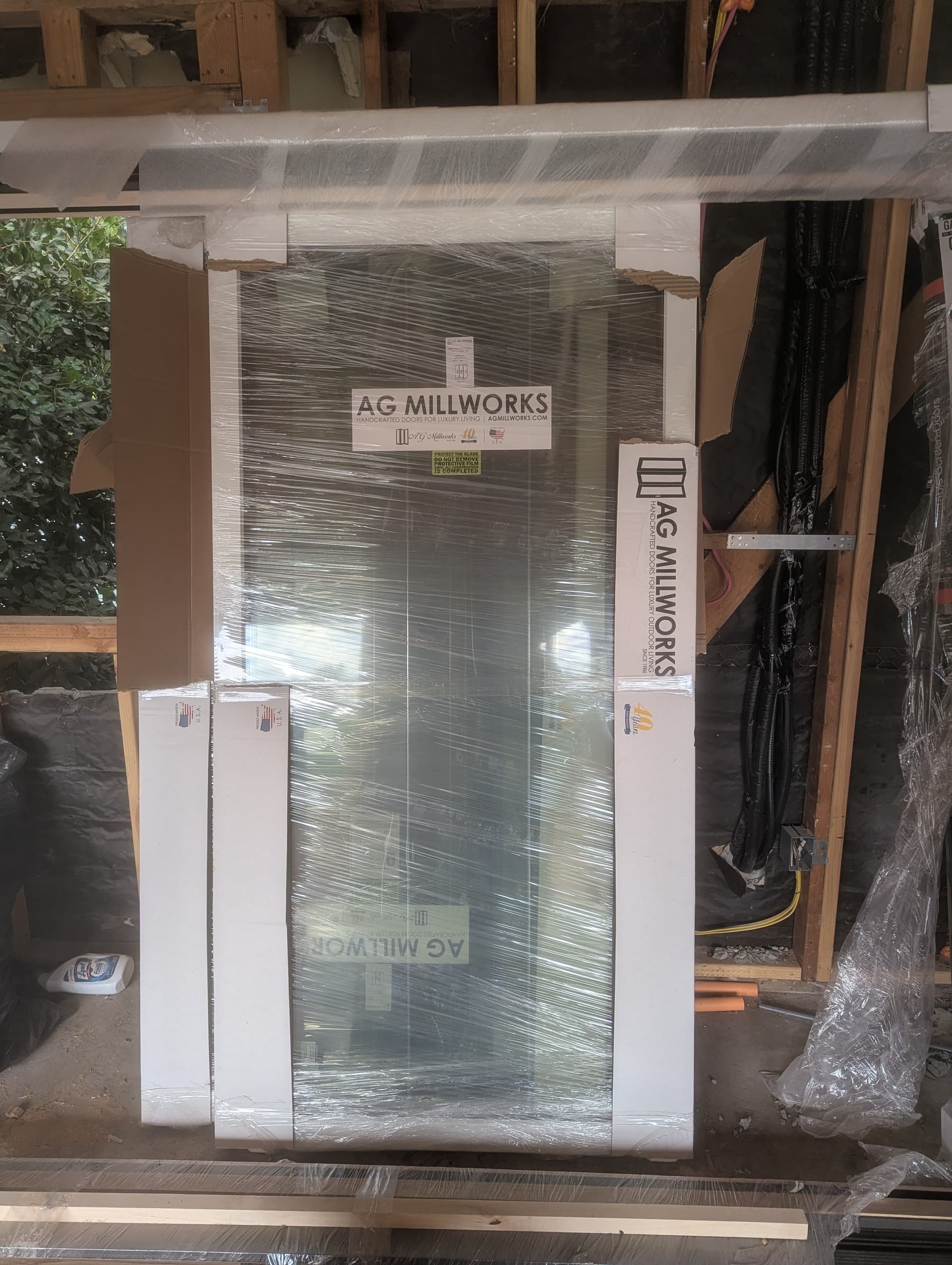 AG Millworks Bi-Fold Patio Door with embedded screen 120 x 80